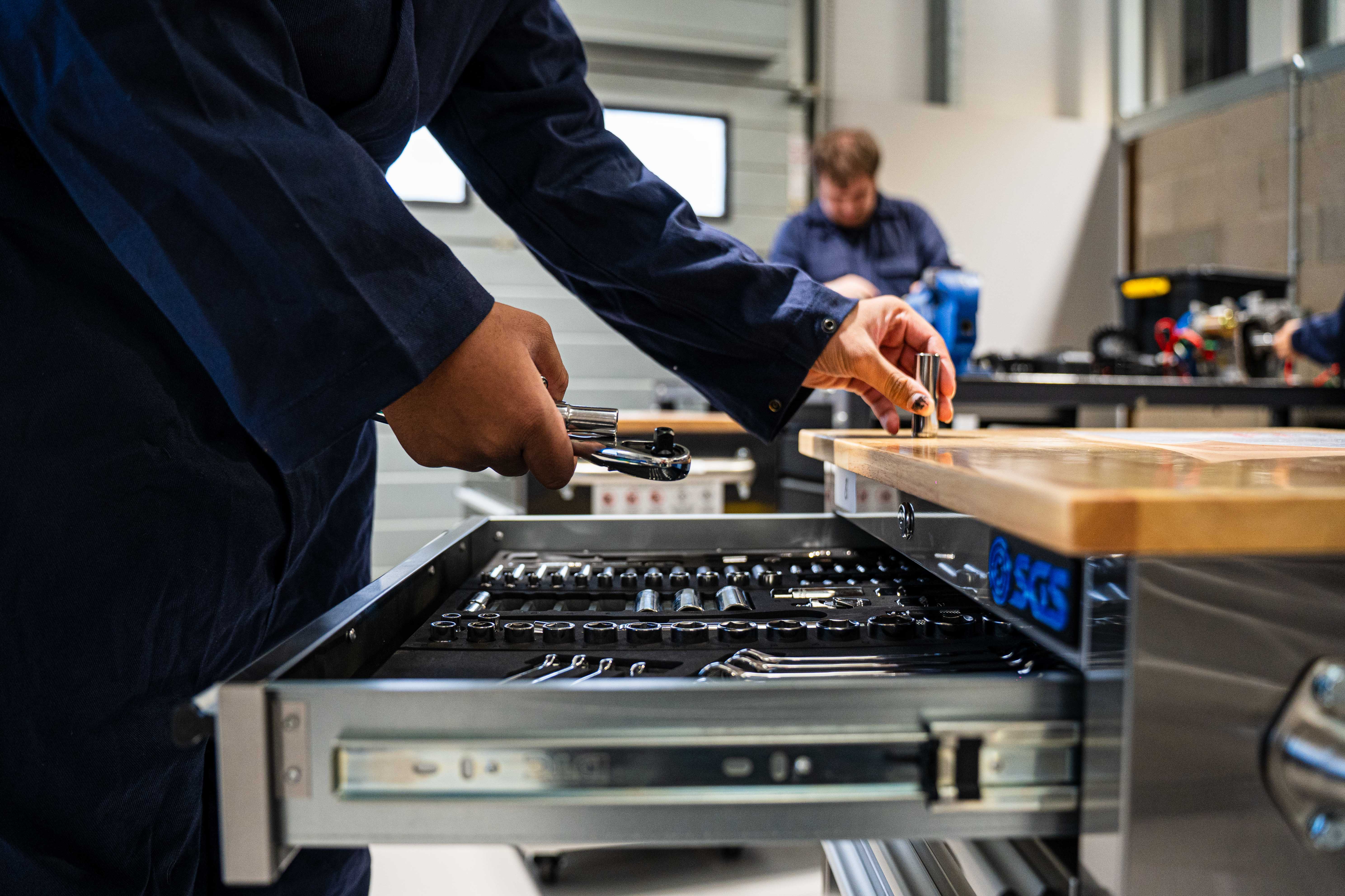 A student in an engineering workshop