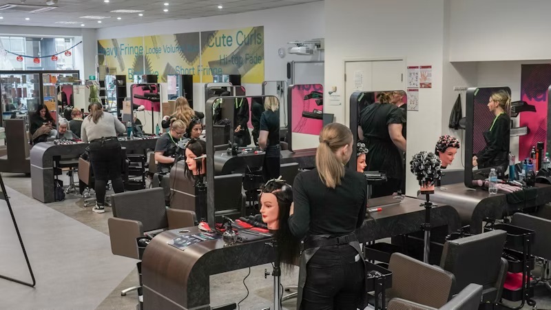 Students in the Wheeler Gate salon.