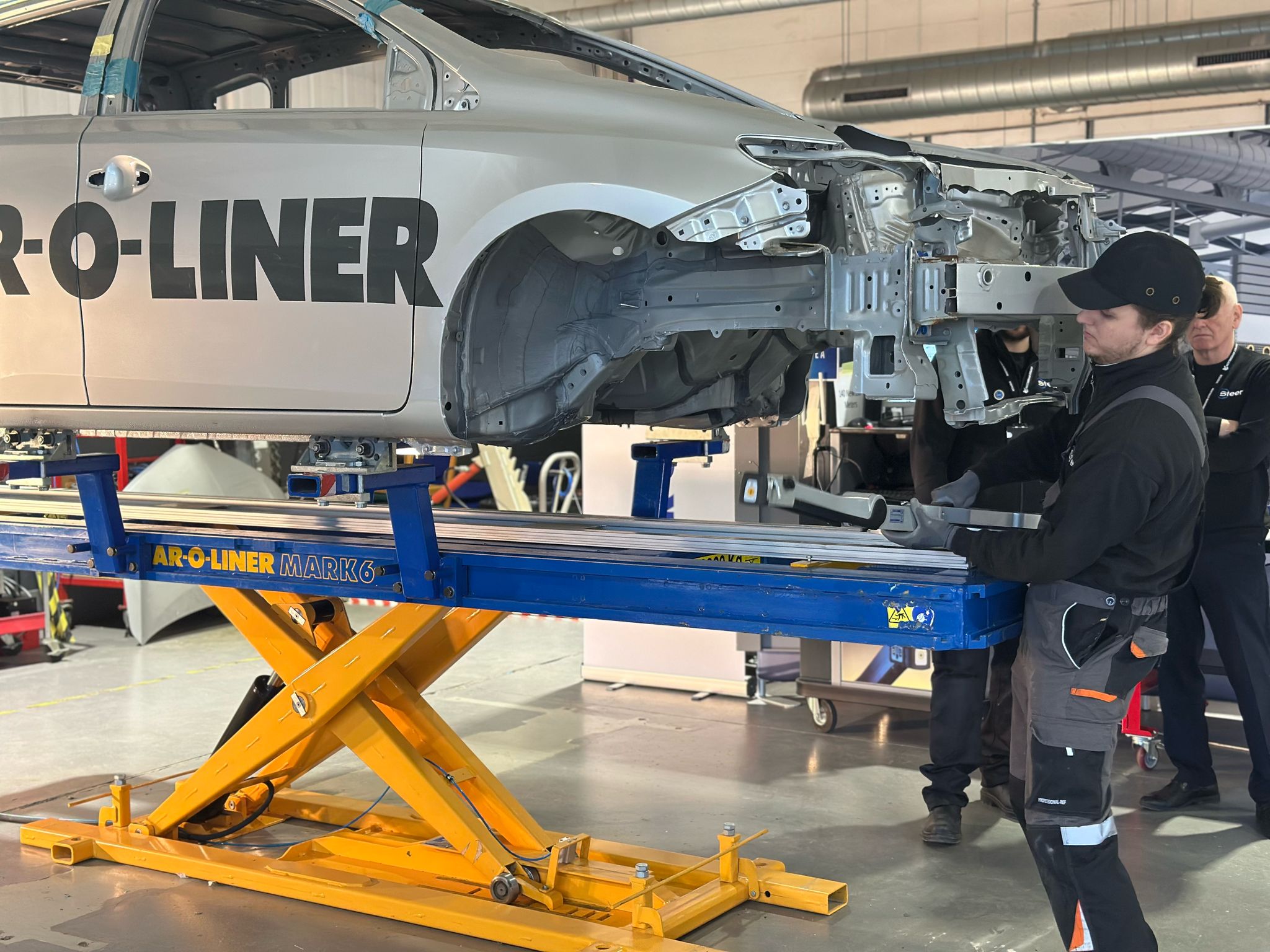 Students working on a car