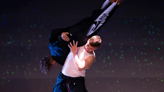 Two dance students performing on stage