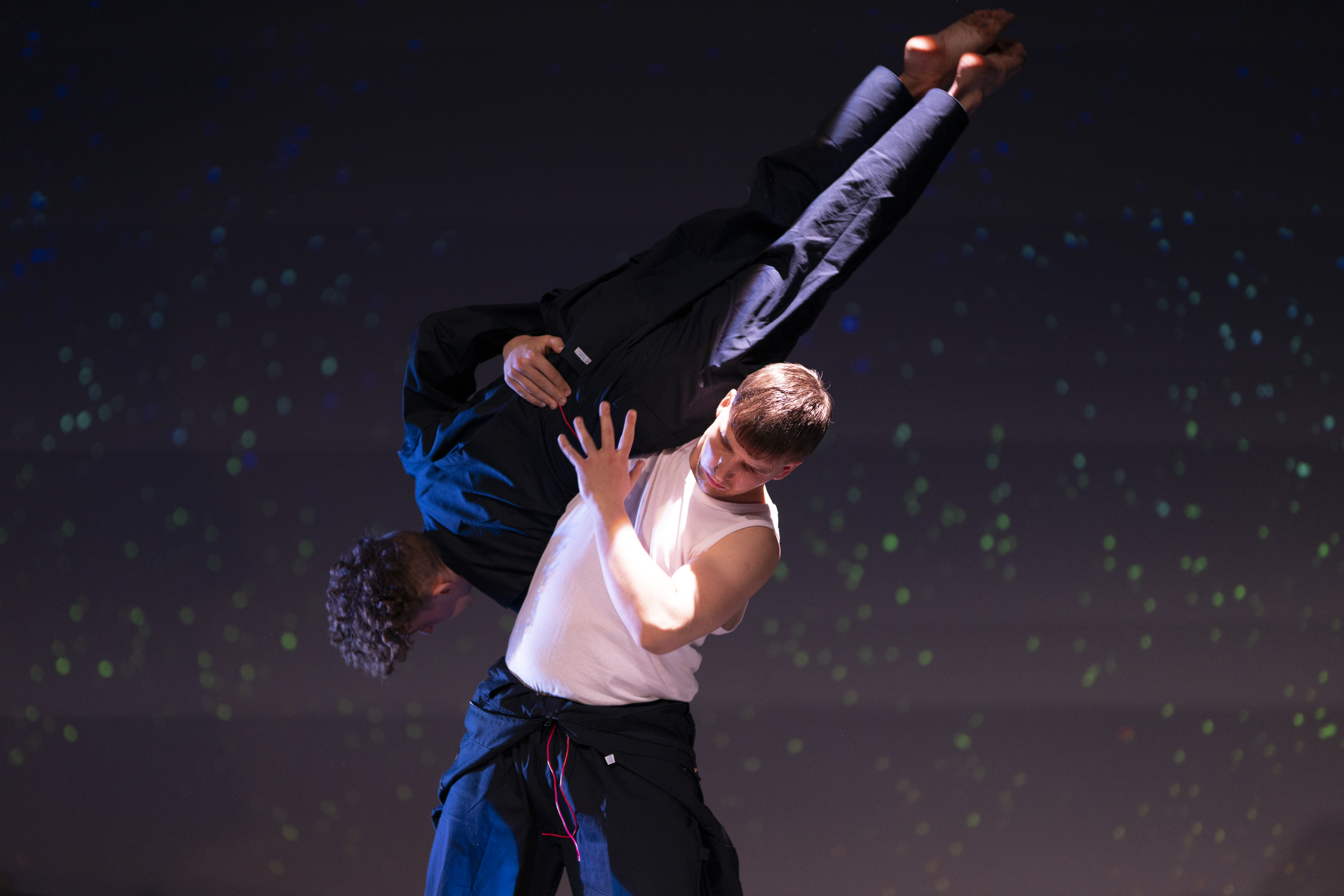 Two dance students performing on stage