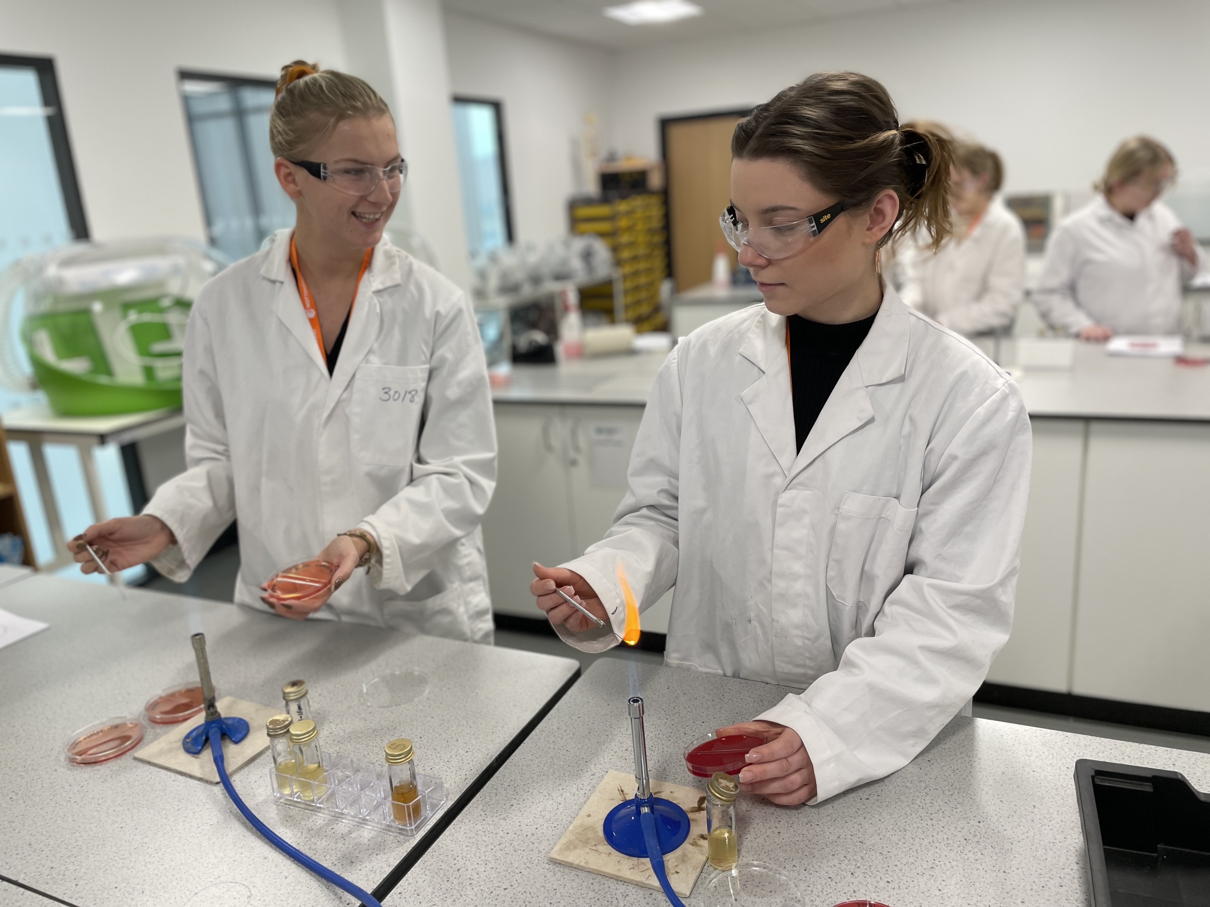 Two students working in a science laboratory.