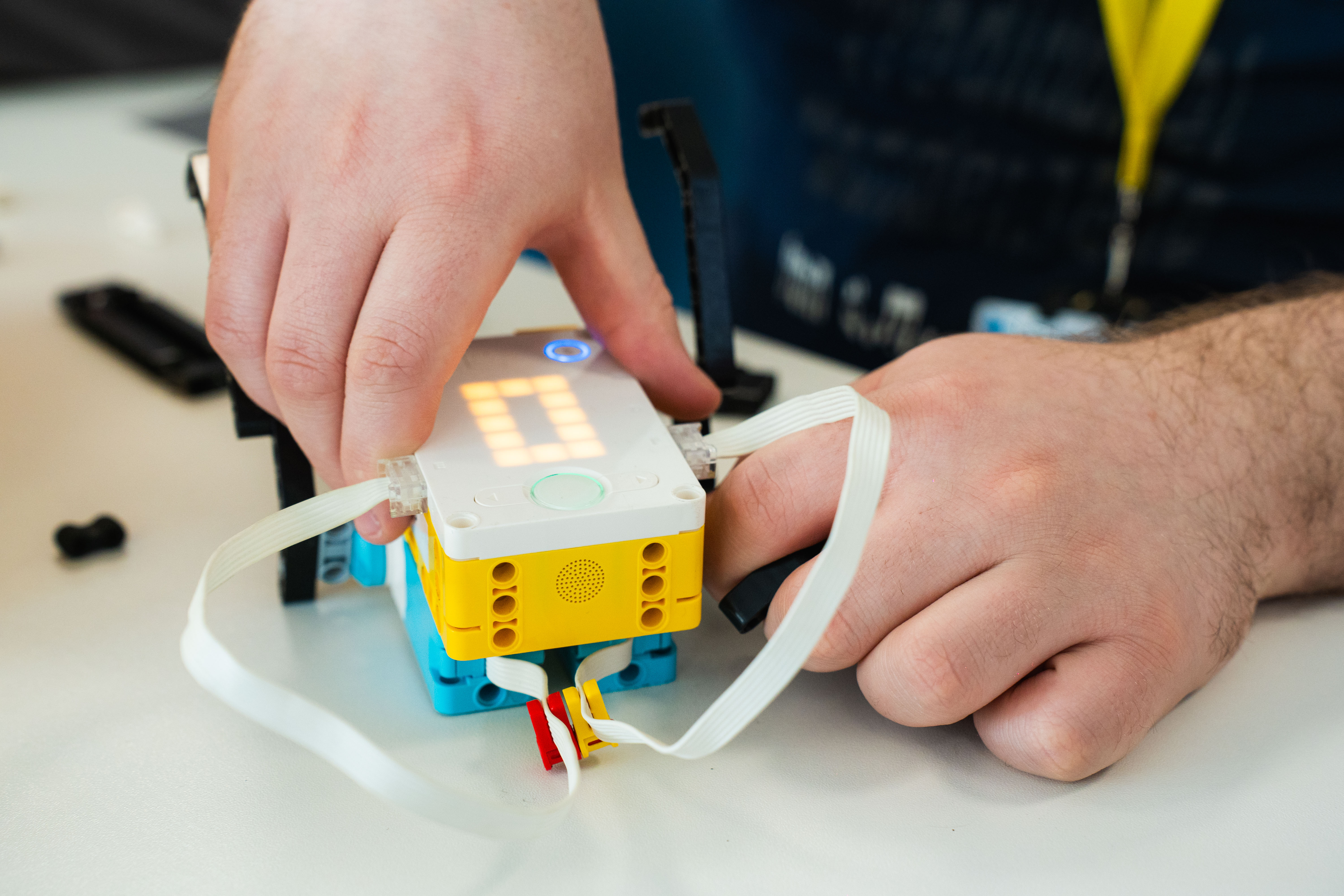 Student building Lego