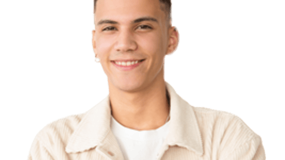 A young man with short hair and a cream jacket and white T-shirt