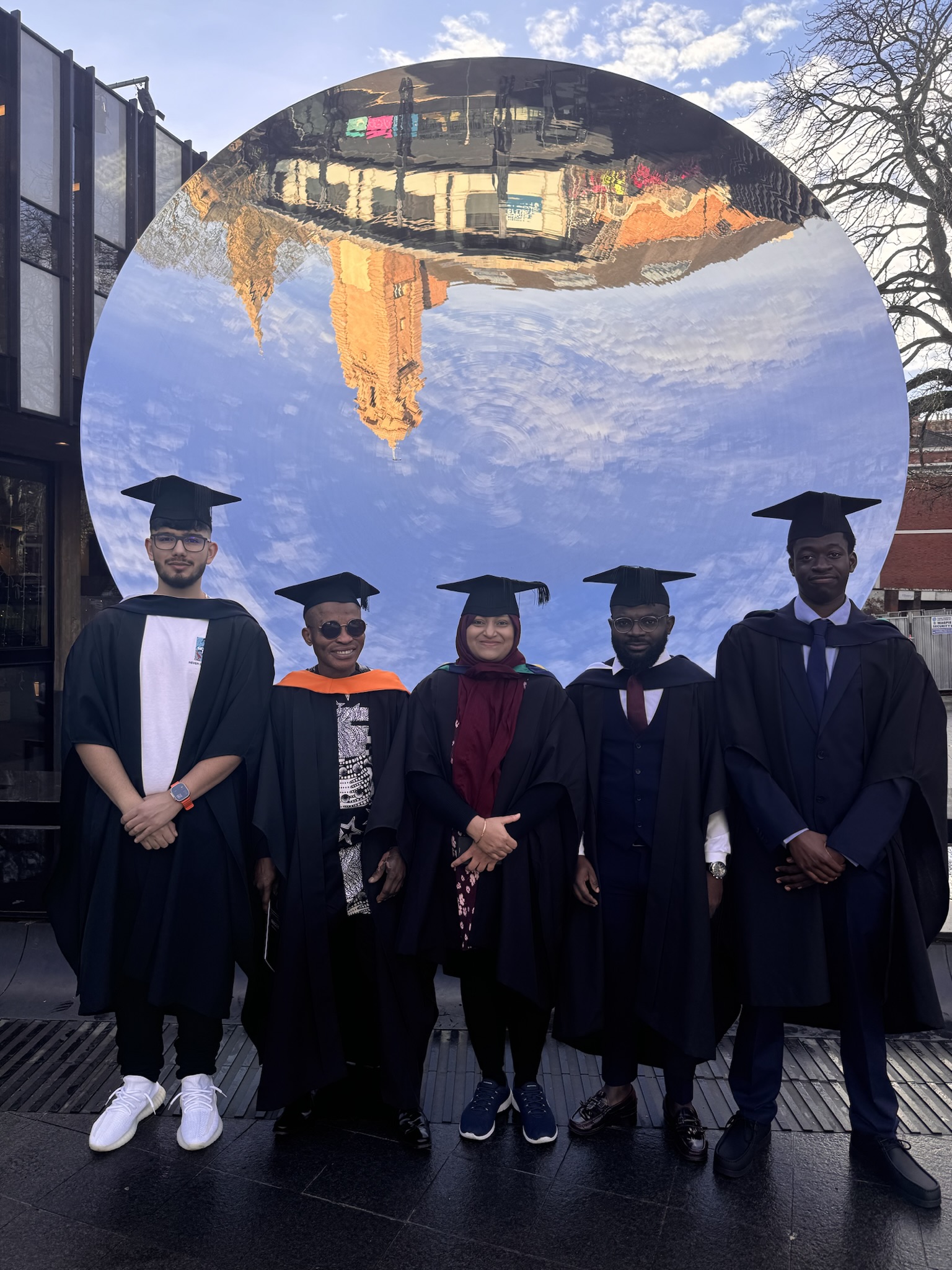 Group of students smiling outside the Albert Hall