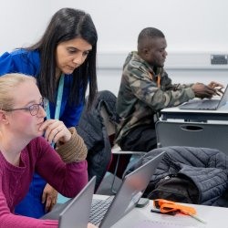 Lecturer with students in a classrom
