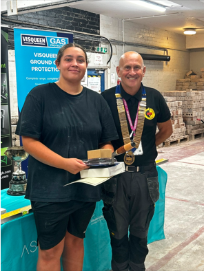 Student receiving first place award