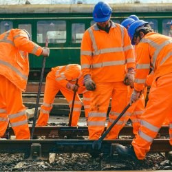Railway workers working on a railway line