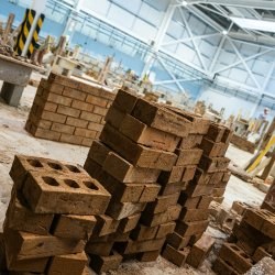 Construction Skills Centre with bricks piled up high