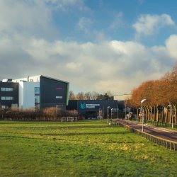 Basford campus from a distance with the Construction Skills Center and main building