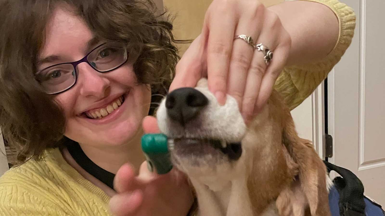 Elana with dog 16x9 AR 25
