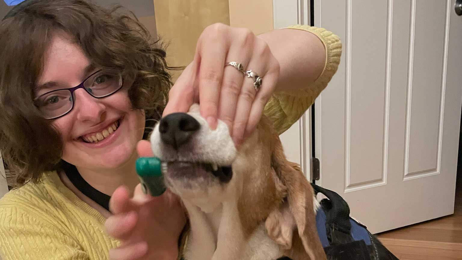 Elana with dog AR 25 16x9