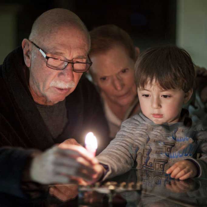 Multigenerational Candle Lighting AR 25