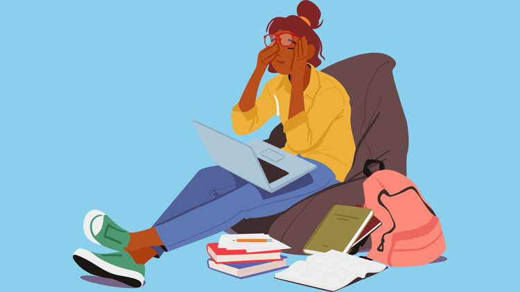 Stressed teenager with laptop and books