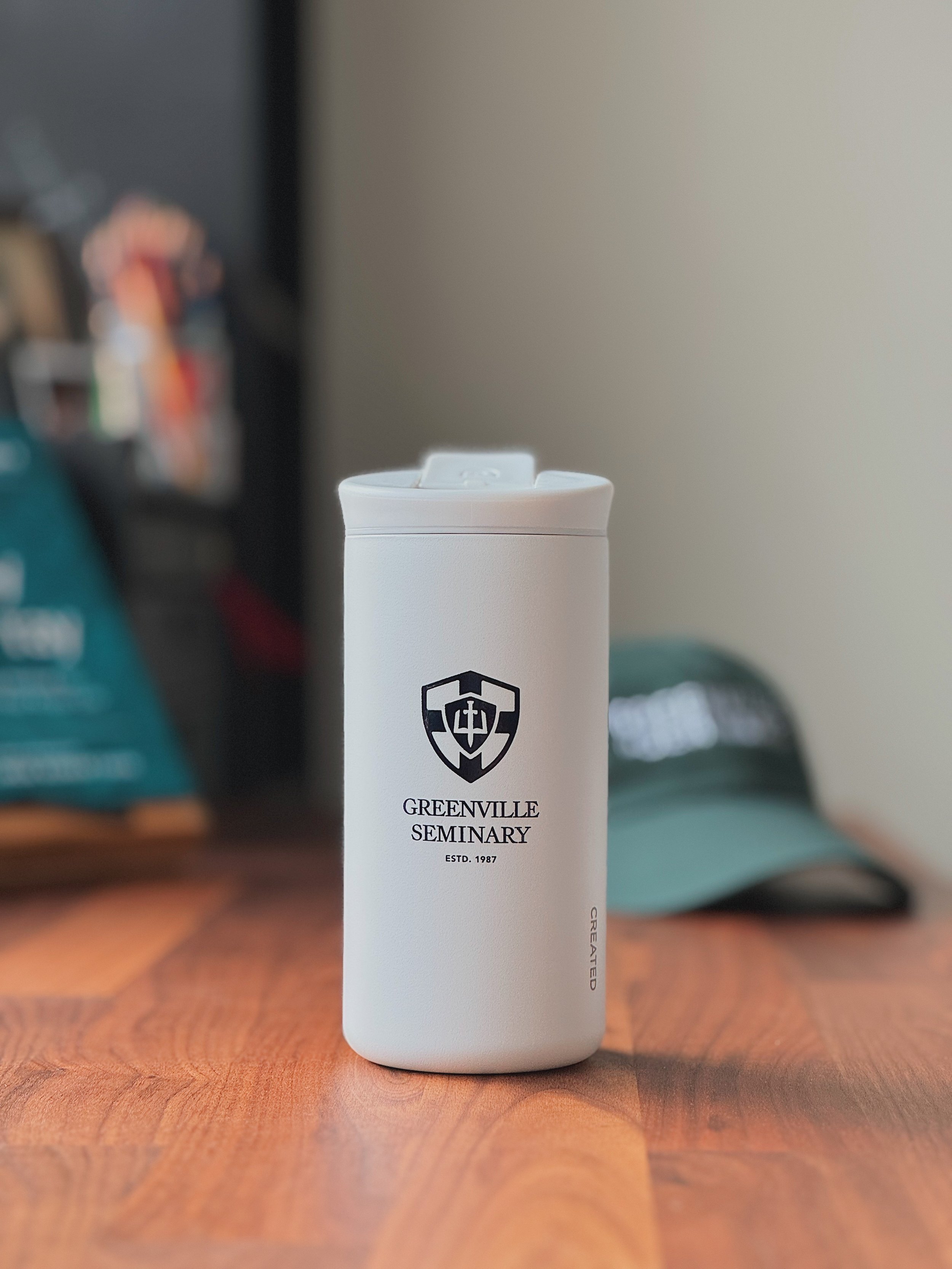 White insulated tumbler featuring the Greenville Seminary crest and text.