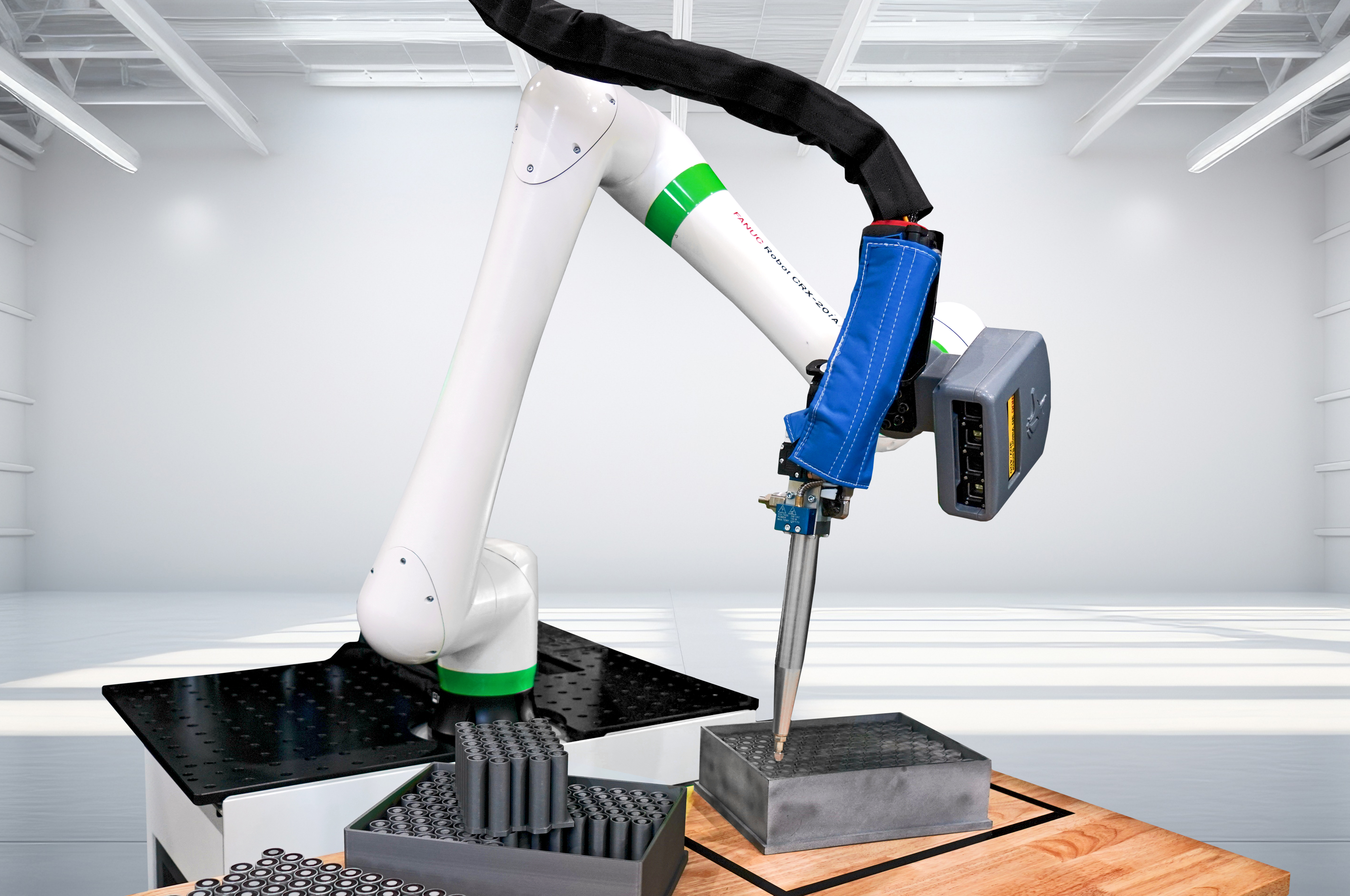 CRX-20iA/L Collaborative Robot in the Act of Dispensing
