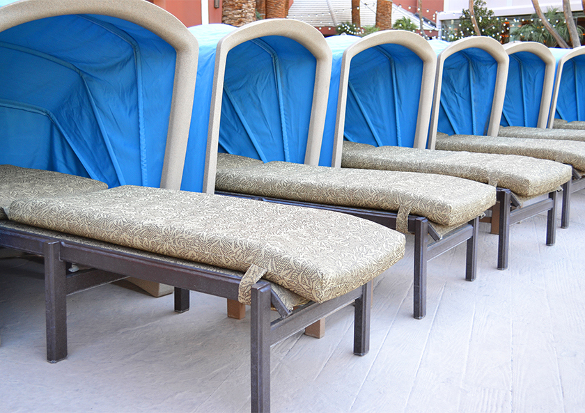 Luxury chairs with awnings up.