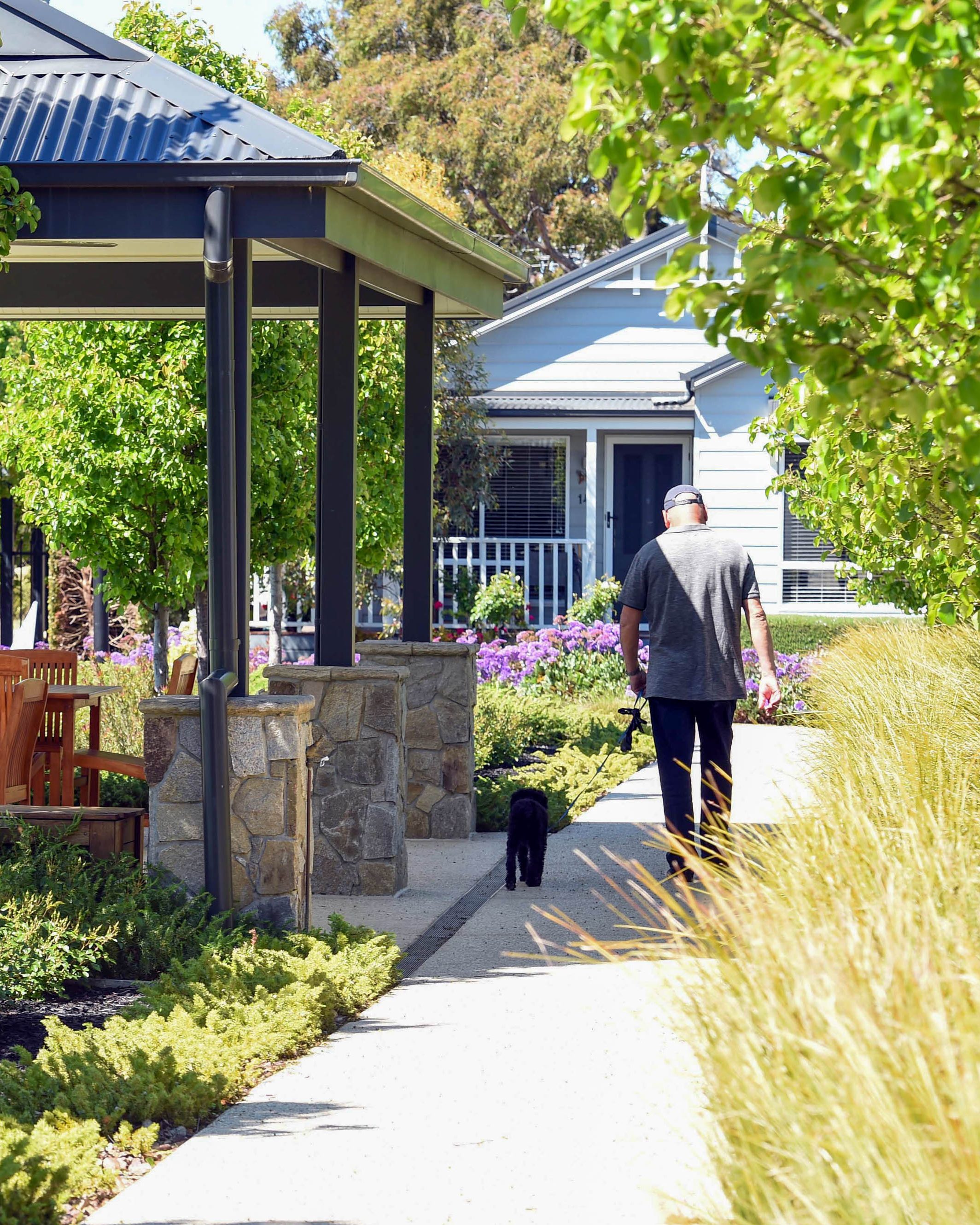Beautifully maintained gardens and walkways weaving through the heart of the community.