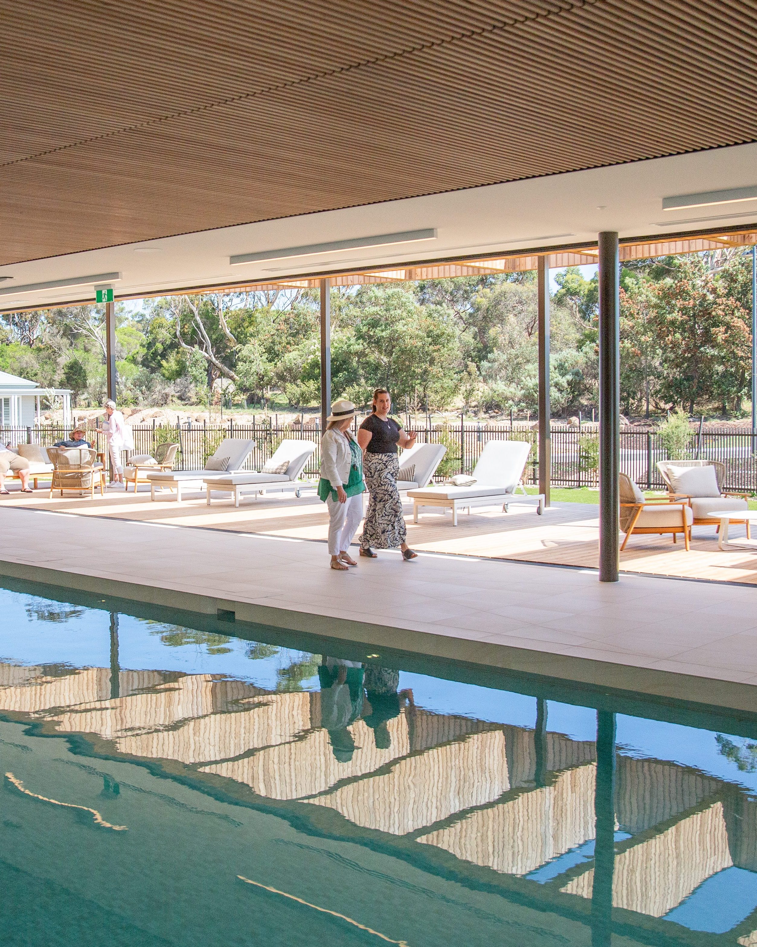 Residents enjoying the indoor pool and relaxation lounge at Lifestyle Phillip Island.