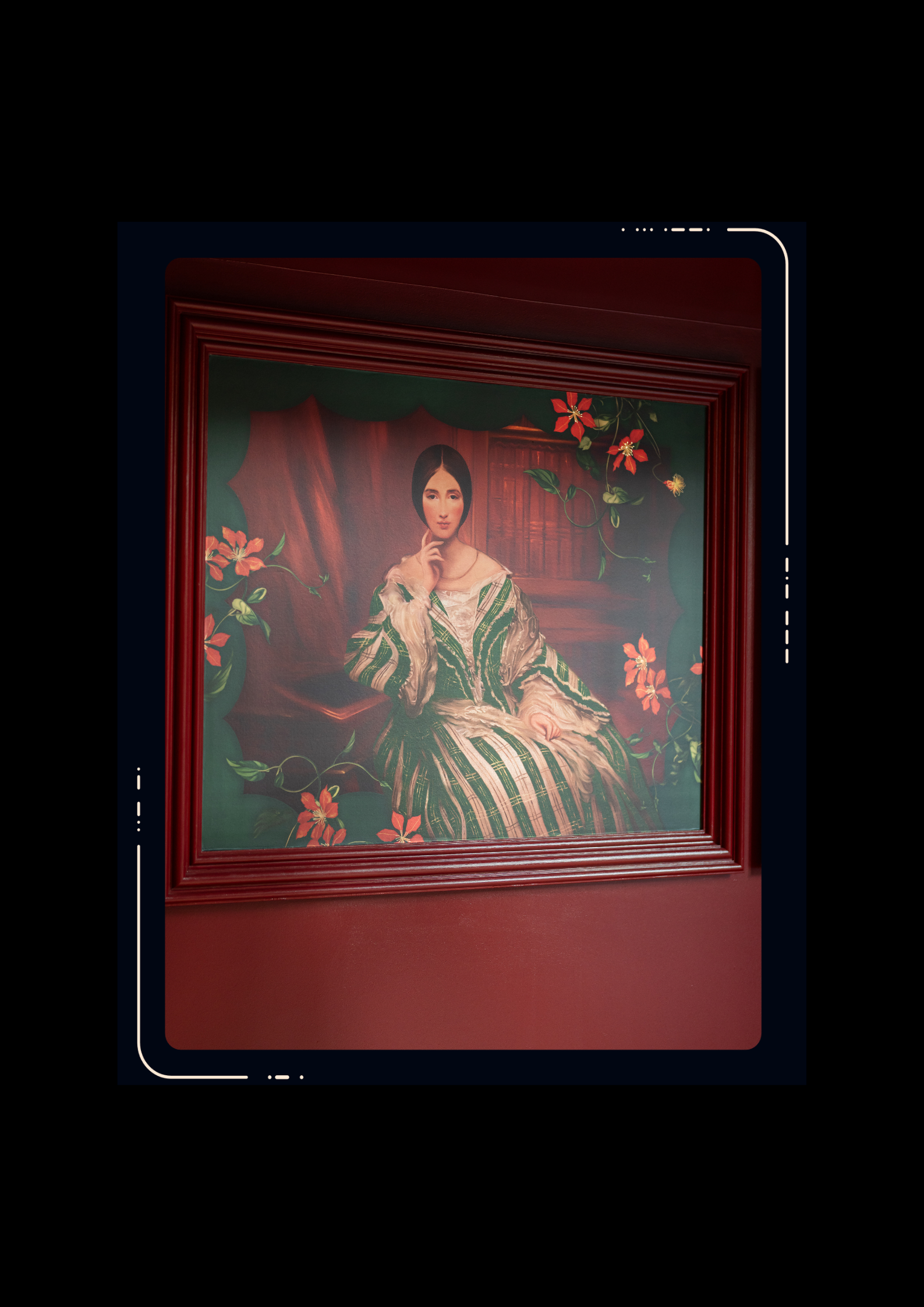 Framed portrait painting of a seated woman in a green and white striped dress, surrounded by red flowers on a teal background, in a dark red frame.