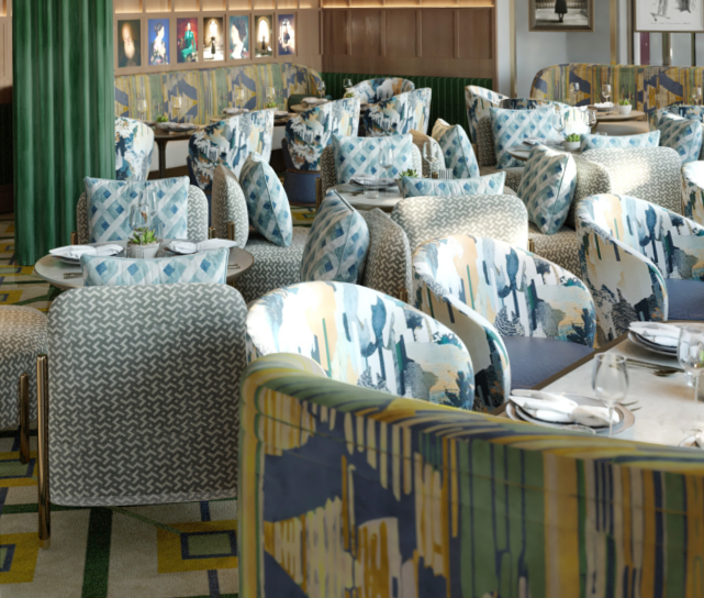 Luxurious dining room with patterned chairs and carpets