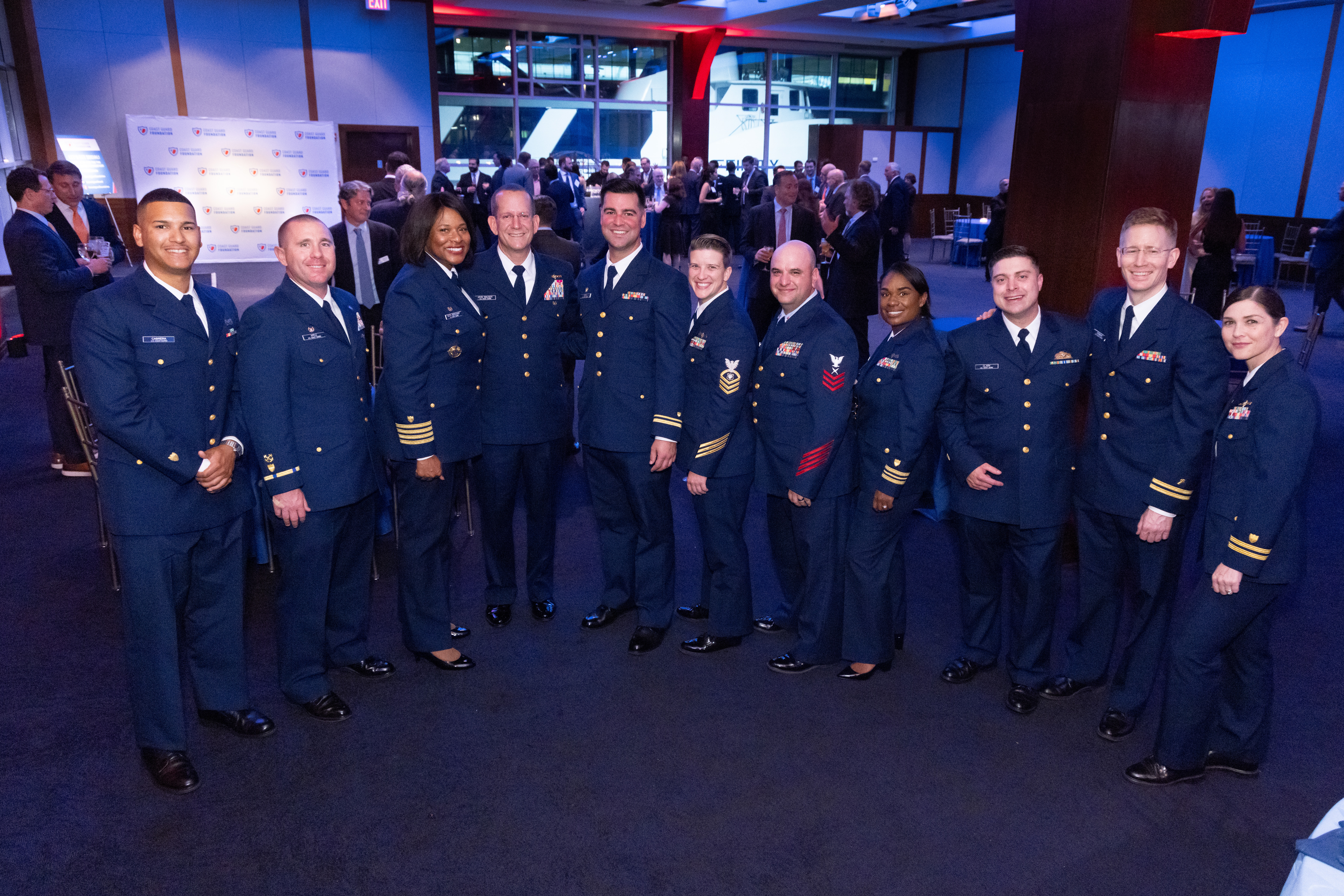 A group of Coast Guard members pose.