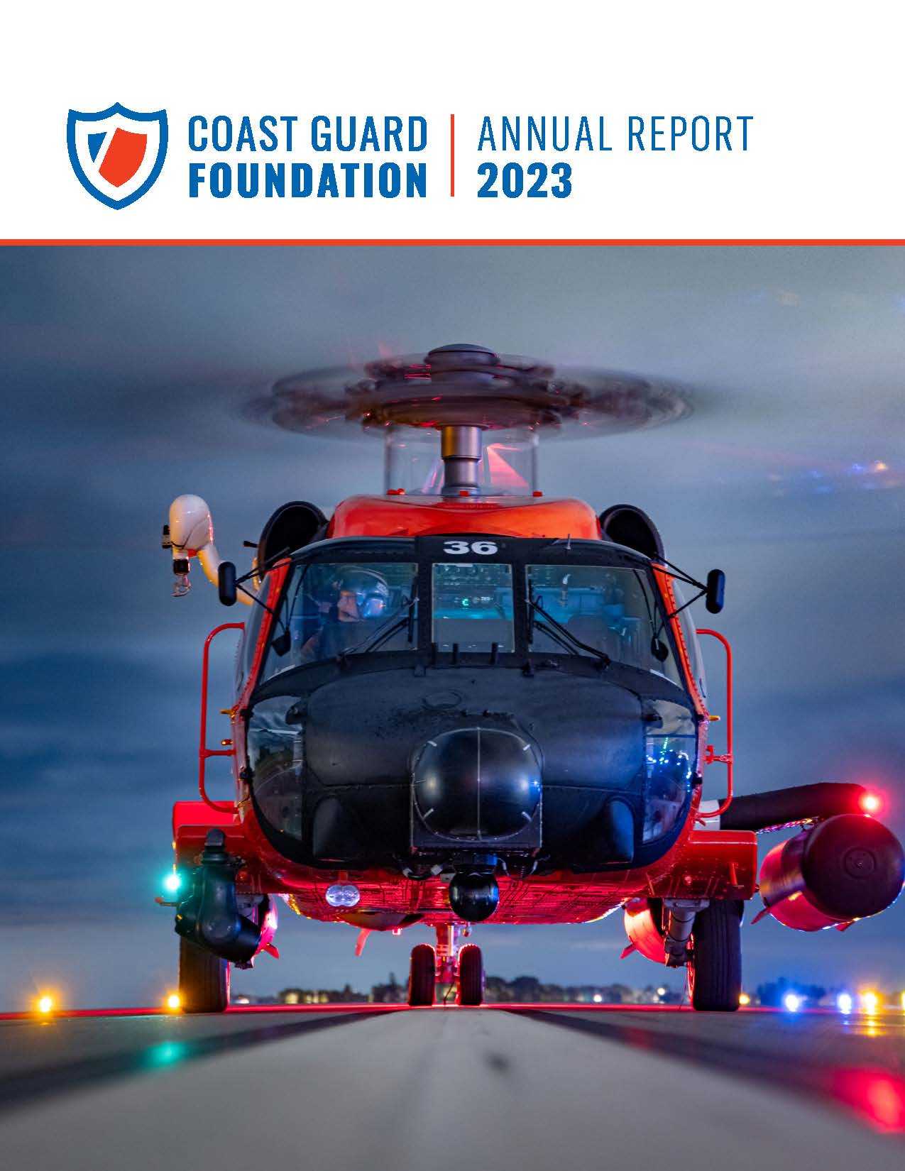 An image of the annual report front cover with a Coast Guard helicopter