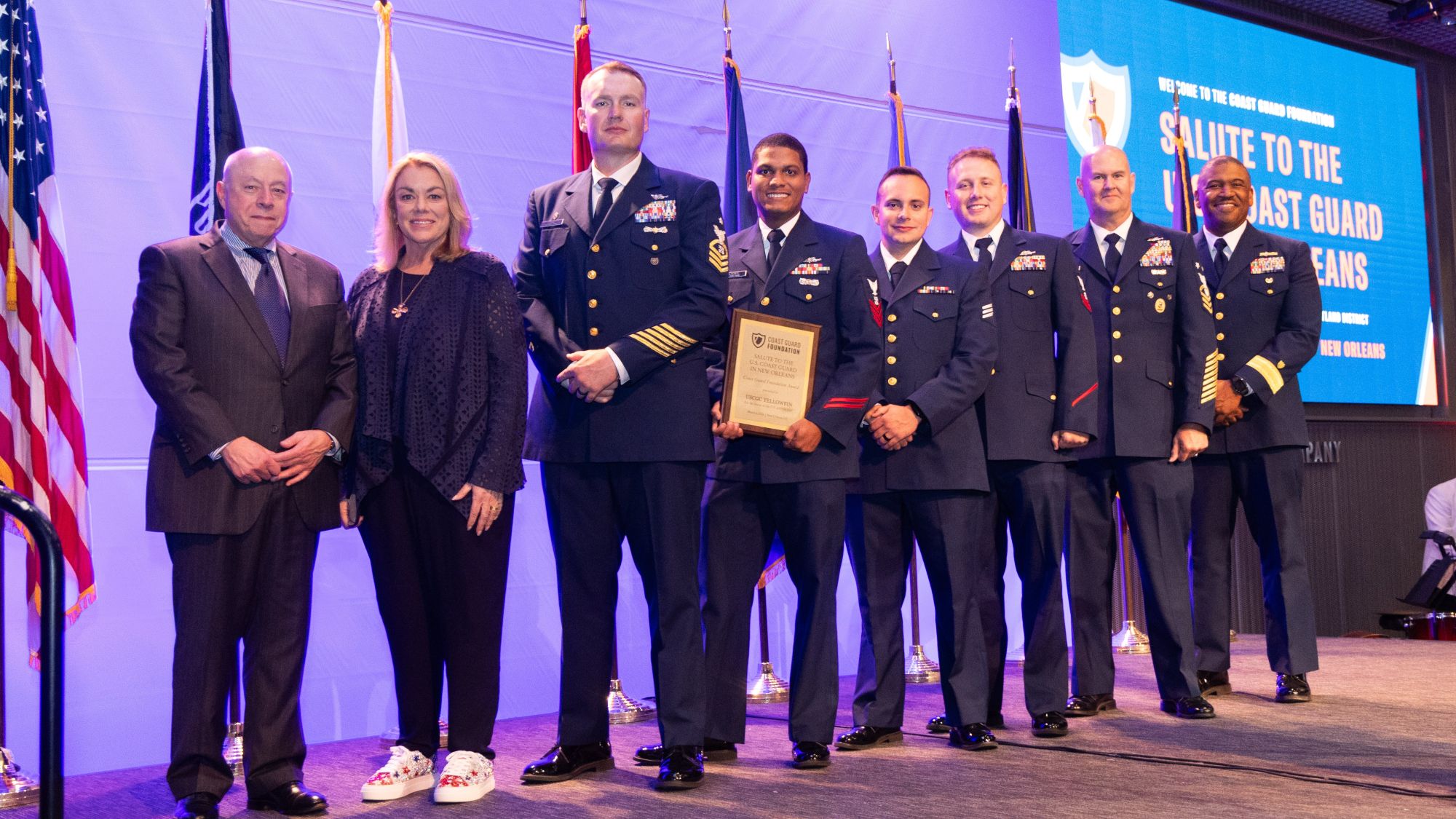 Crew of the Coast Guard Cutter Yellowfin receive an award.