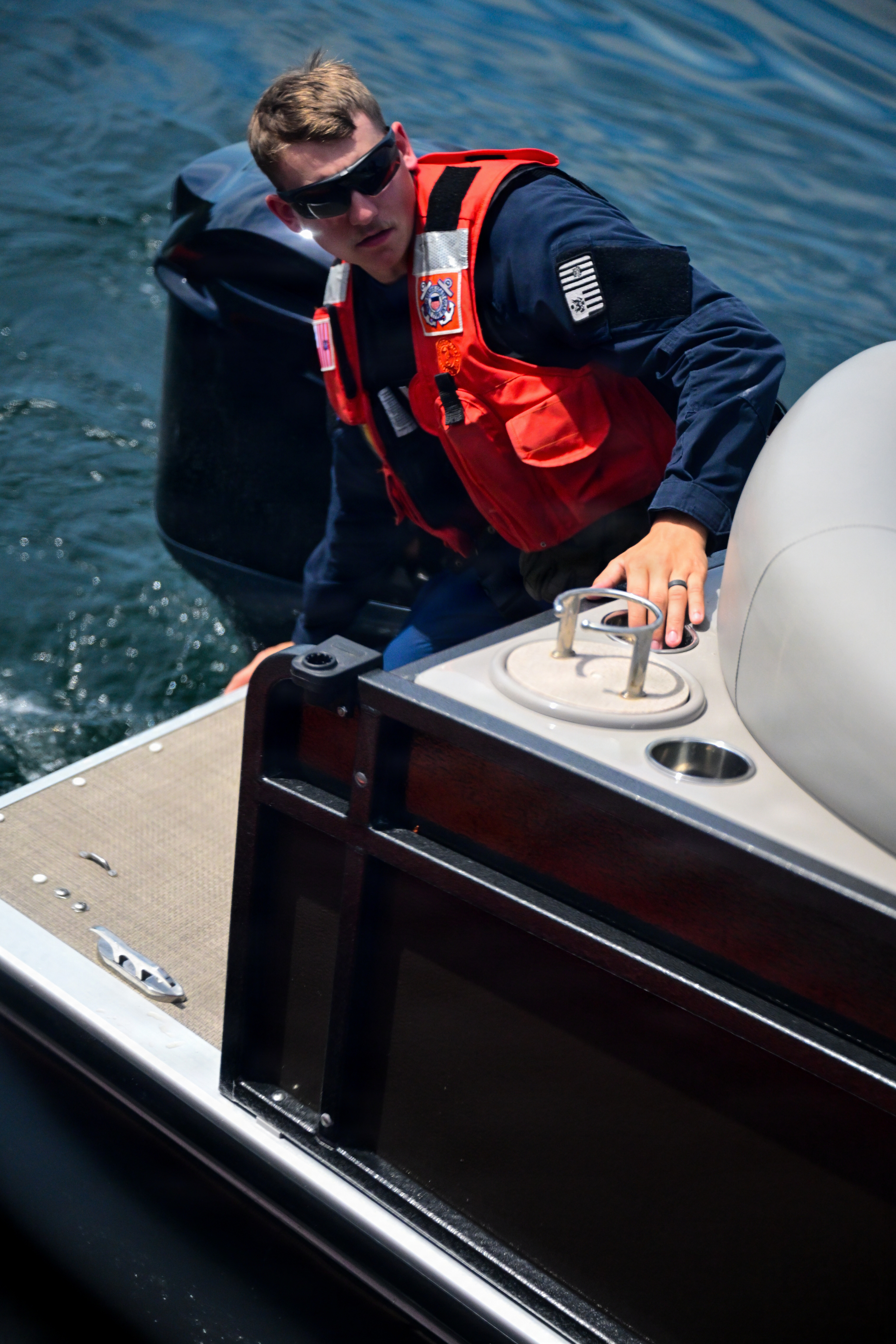 Coast Guard petty officer conducts a recreational boating safety boarding in Puget Sound near Seattle during World Cup 2026.