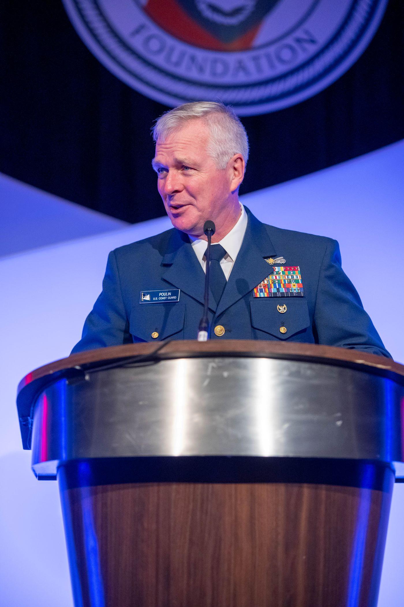 Vice Commandant of the Coast Guard Adm. Steve Poulin speaks at the podium 2022 Texas Salutes the Coast Guard event in Houston, Nov. 4, 2022.