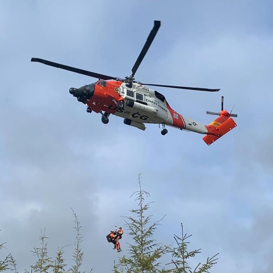 A helicopter hovering.