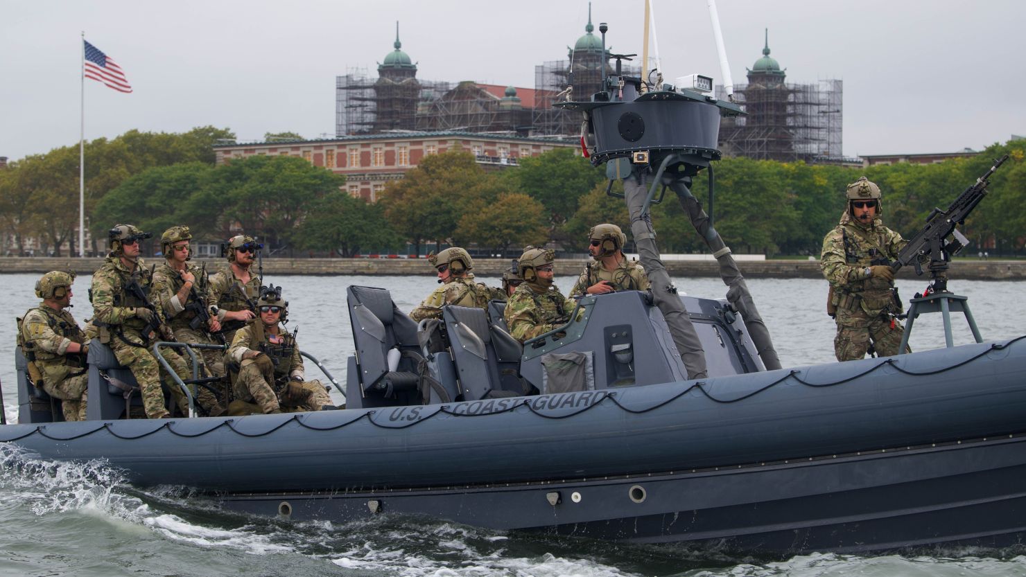 Coast Guard MSRT members aboard a boat.