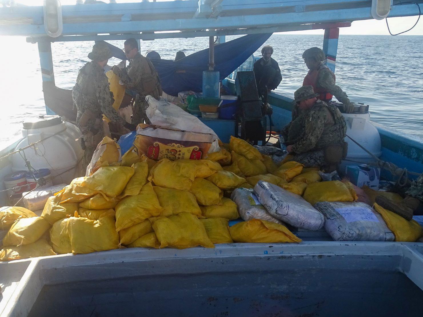 A photo of illicit drugs sig on the deck of a fishing vessel.