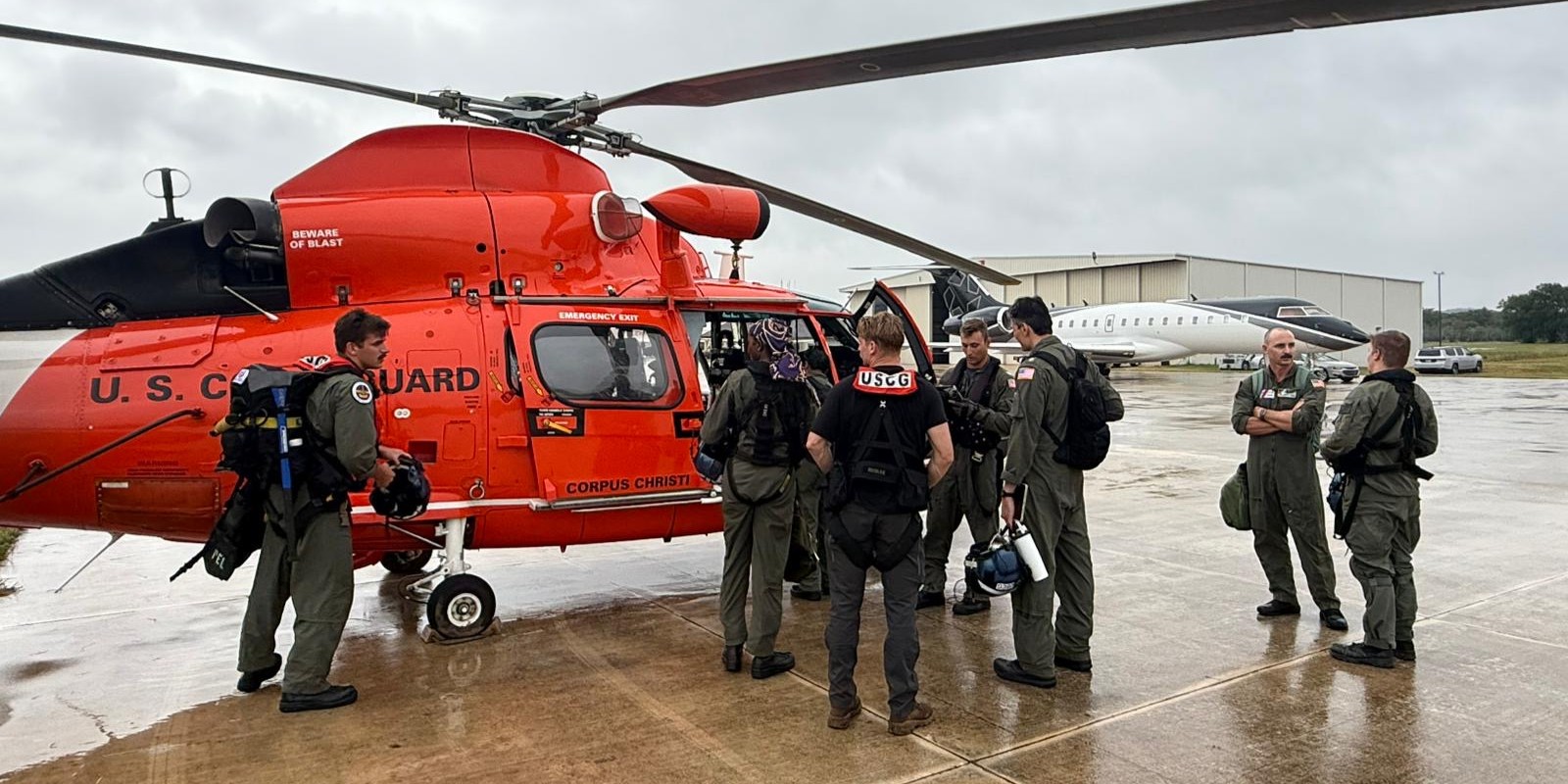 Coast Guard Air Station Corpus Christi crews prepare helicopter for Texas Hill Country flood rescue operations