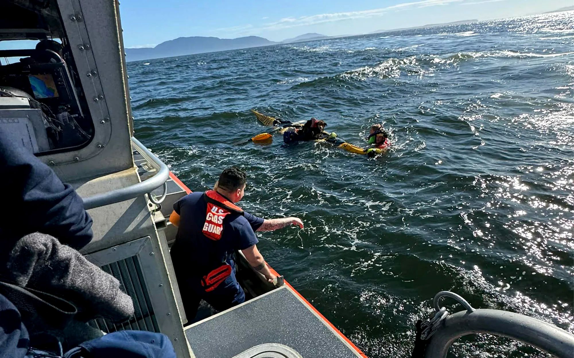 boat crew and swimmers