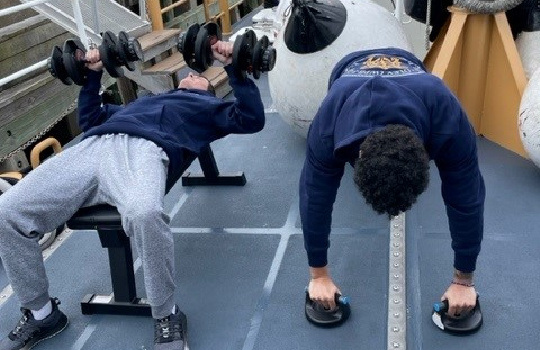 COAST GUARD MEMBERS ON THE CUTTER RIDLEY
USE FOUNDATION-PURCHASED FITNESS GEAR TO
STAY IN SHAPE WHILE ON DUTY AND UNDERWAY.