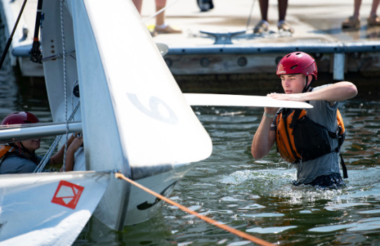 SUPPORT FOR CADETS AT THE COAST GUARD ACADEMY INCLUDED ACADEMIC
ENRICHMENT, LEADERSHIP TRAINING, ATHLETICS, AND WATERFRONT PROGRAMS
LIKE SAIL TRAINING. USCG PHOTO BY PETTY OFFICER 3RD CLASS MATTHEW THIEME