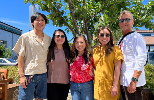 JOHNNIE, PICTURED HERE WITH HIS FAMILY, IS THE RECIPIENT OF THE CAPTAIN JAMES F. PHAIR, USCG, MEMORIAL SCHOLARSHIP, ESTABLISHED BY JOE AND BONNIE IN MEMORY OF JOE’S FATHER.